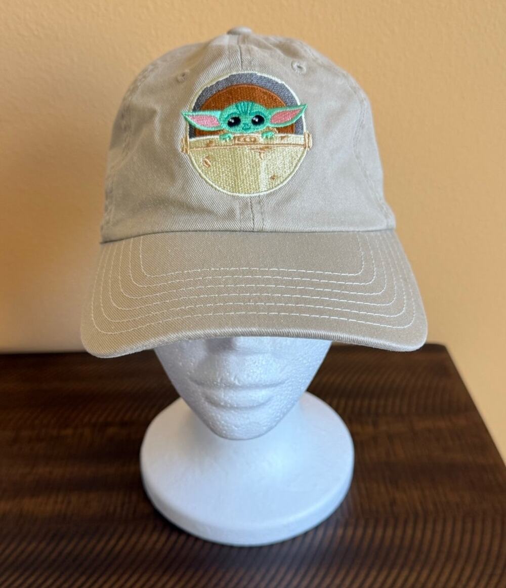 Star Wars Mandalorian dad hat embroidered Baby Yoda Grogu peeking out from a pod